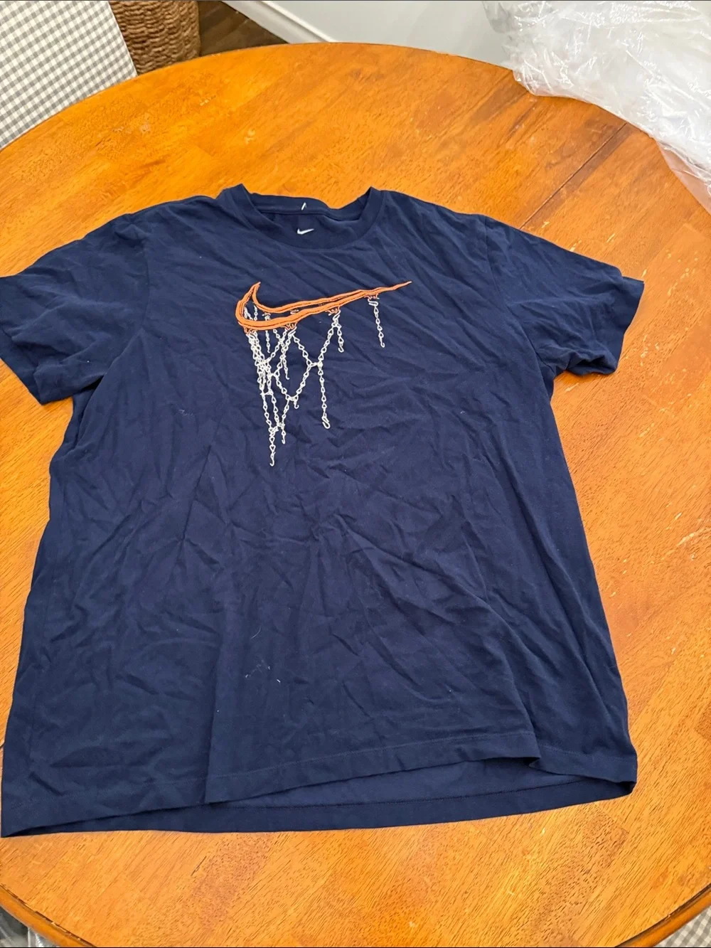 Nike Navy Tee with Orange Swoosh and Silver Chain Graphic